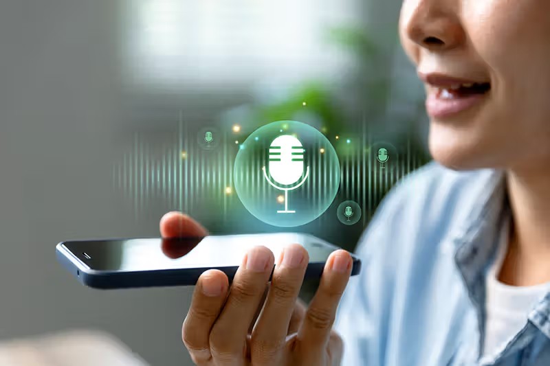 A consumer speaking with a voice agent on a mobile phone